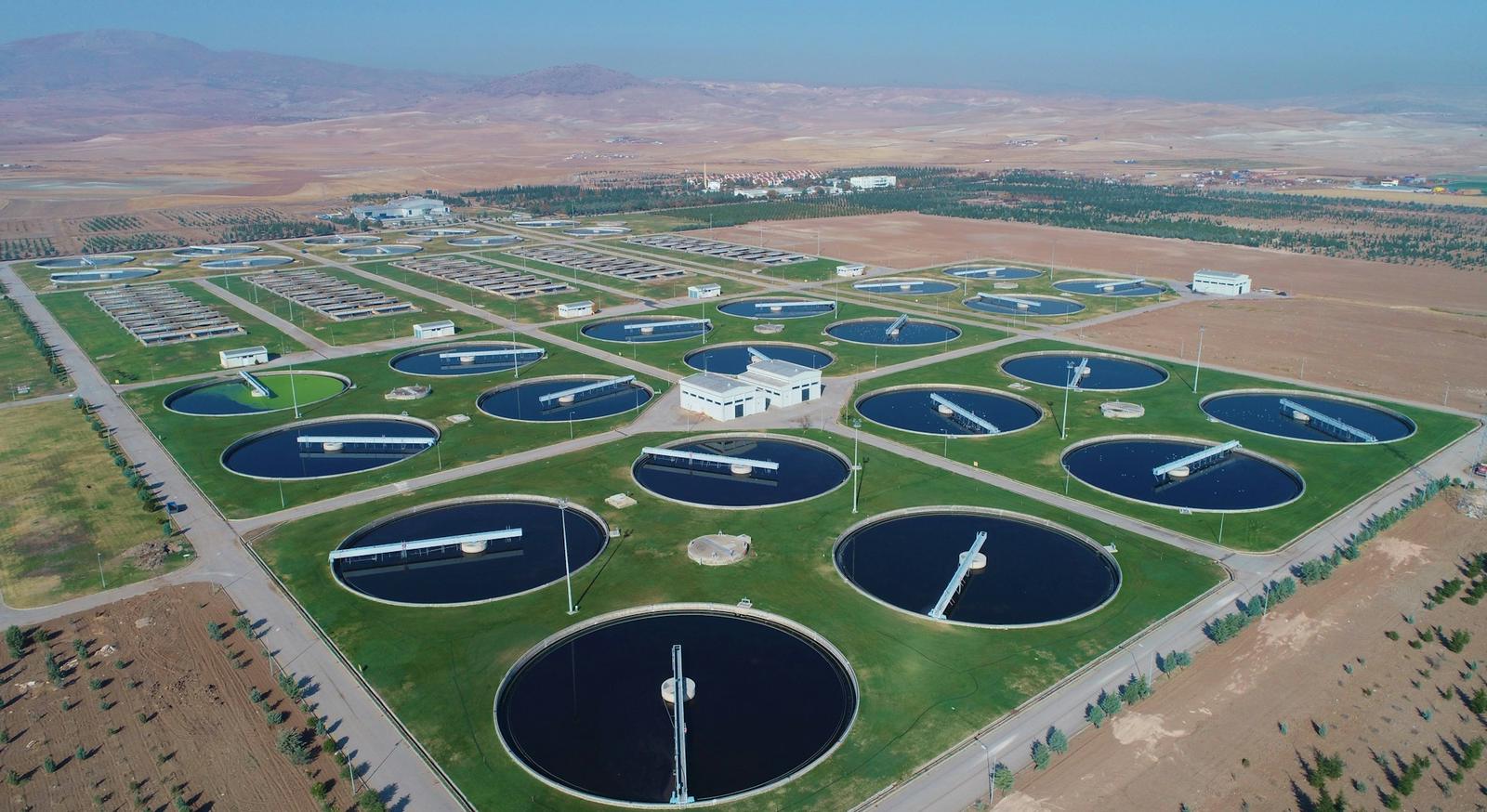 Aerial view of a treatment plant with circular clarifiers